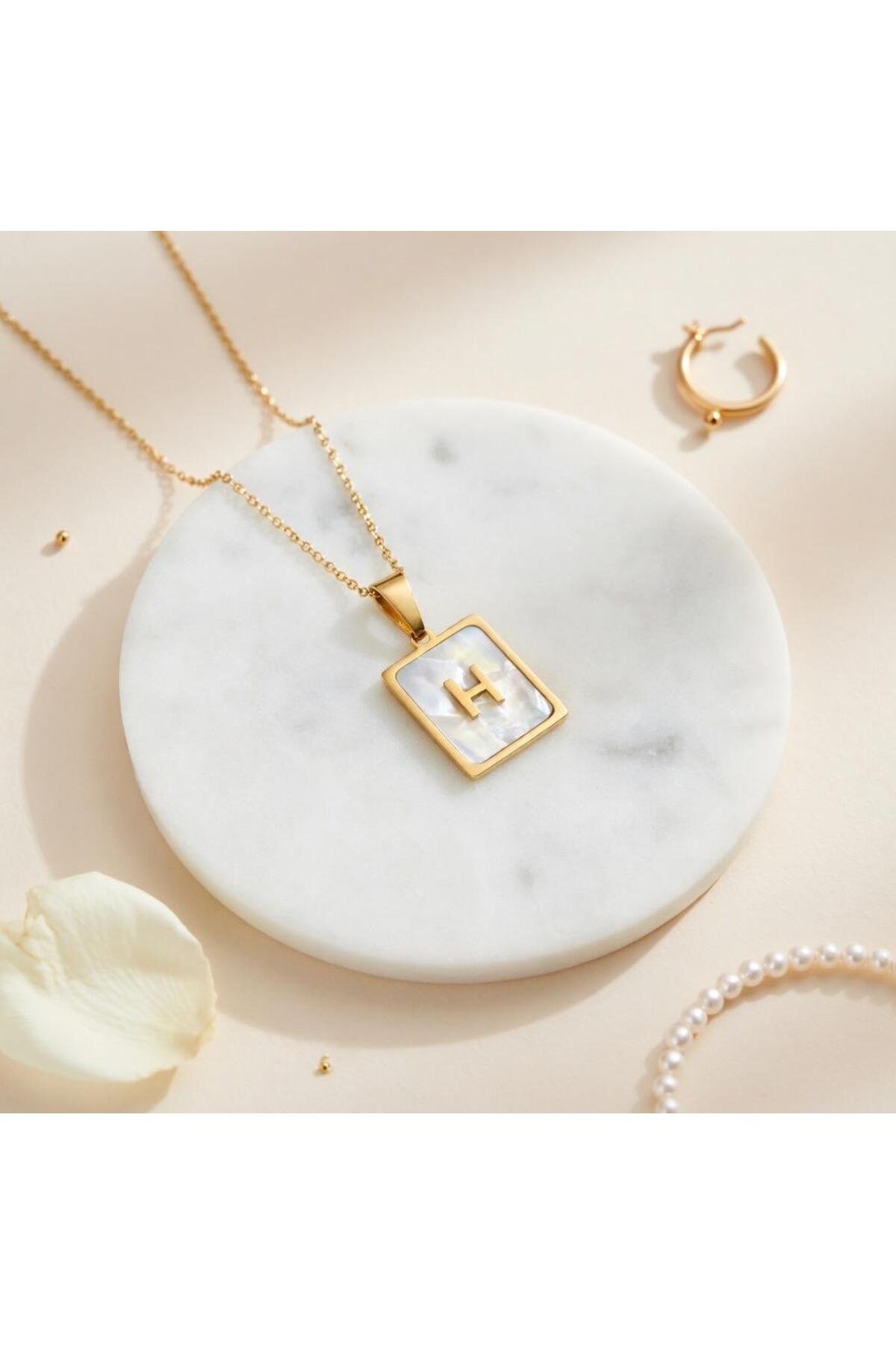 Çelik sedefli H harfli kolye