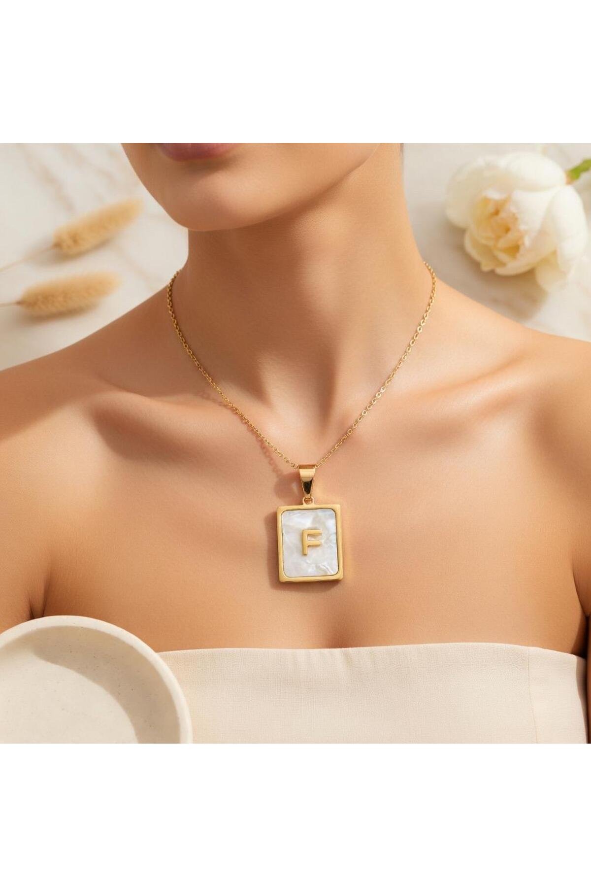 Çelik sedefli F harfli kolye