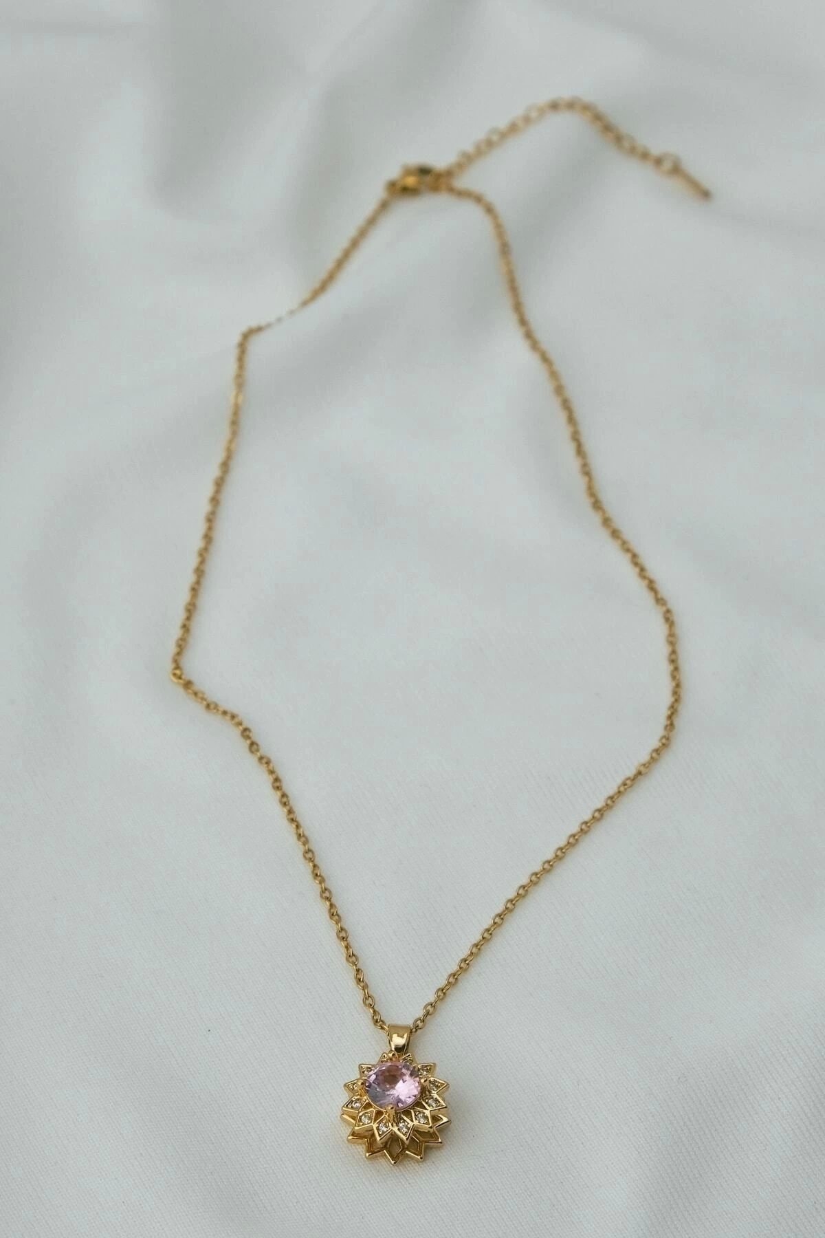 Rotating Steel Necklace with Pink Zircon Gemstone